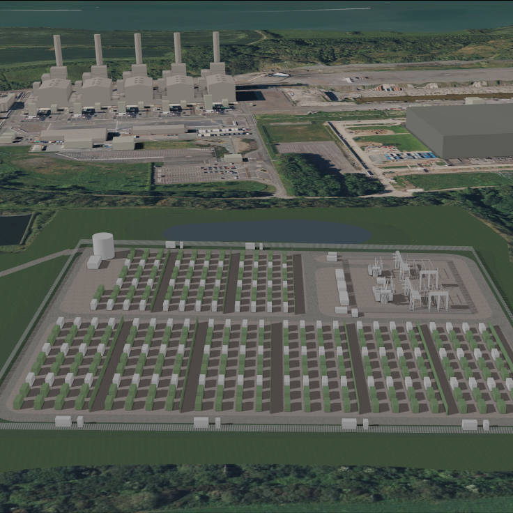 Aerial view of a power plant with cooling towers, adjacent facilities, and a grid layout for potential energy generation.