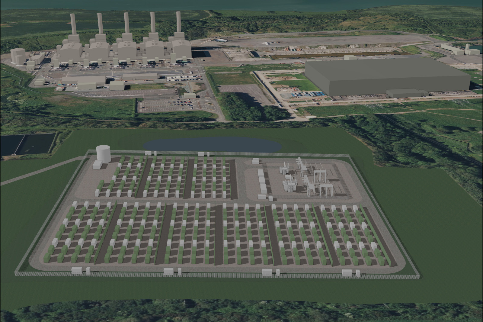 Aerial view of an industrial site featuring power plant structures, storage areas, and electrical equipment.