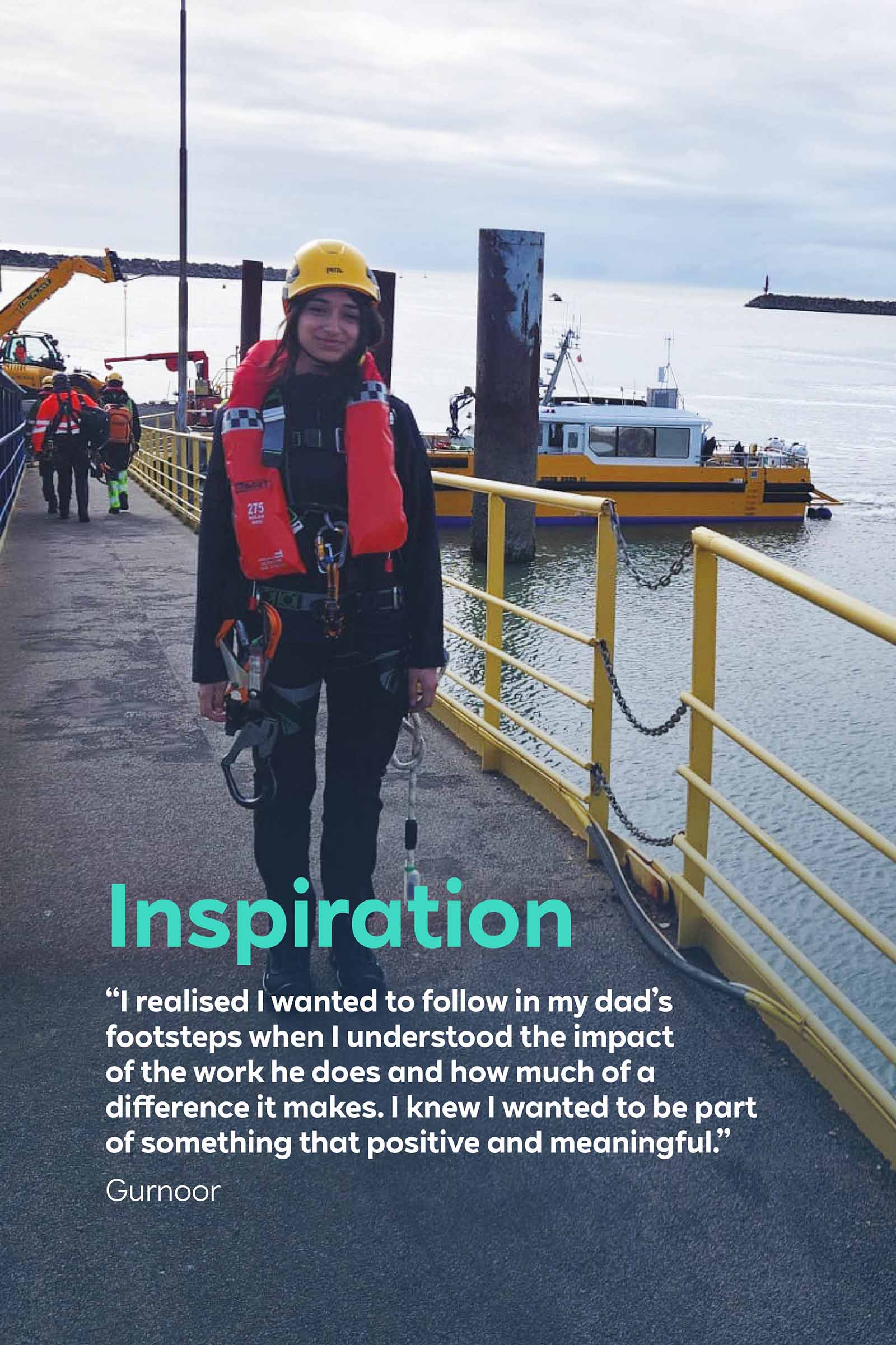 A person in safety gear stands on a dock, with boats and a yellow railing visible in the background, conveying a sense of purpose.