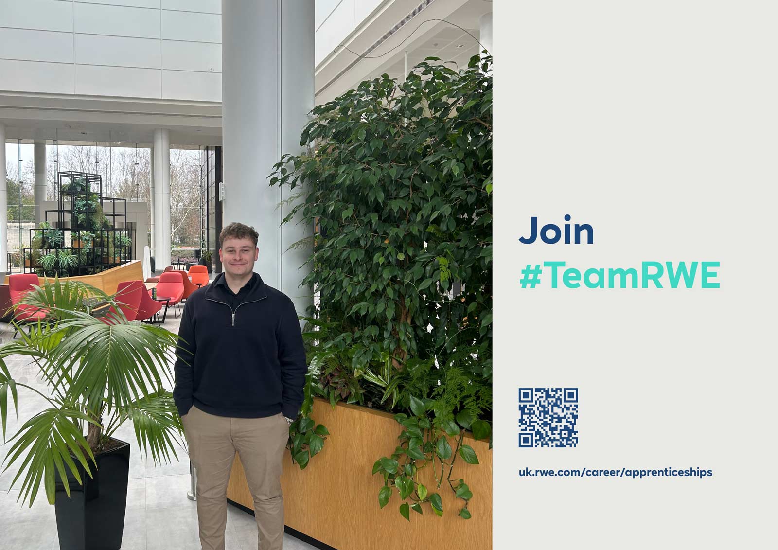 A person stands next to a green plant in a modern office space with red chairs and a promotional message for RWE apprenticeships.