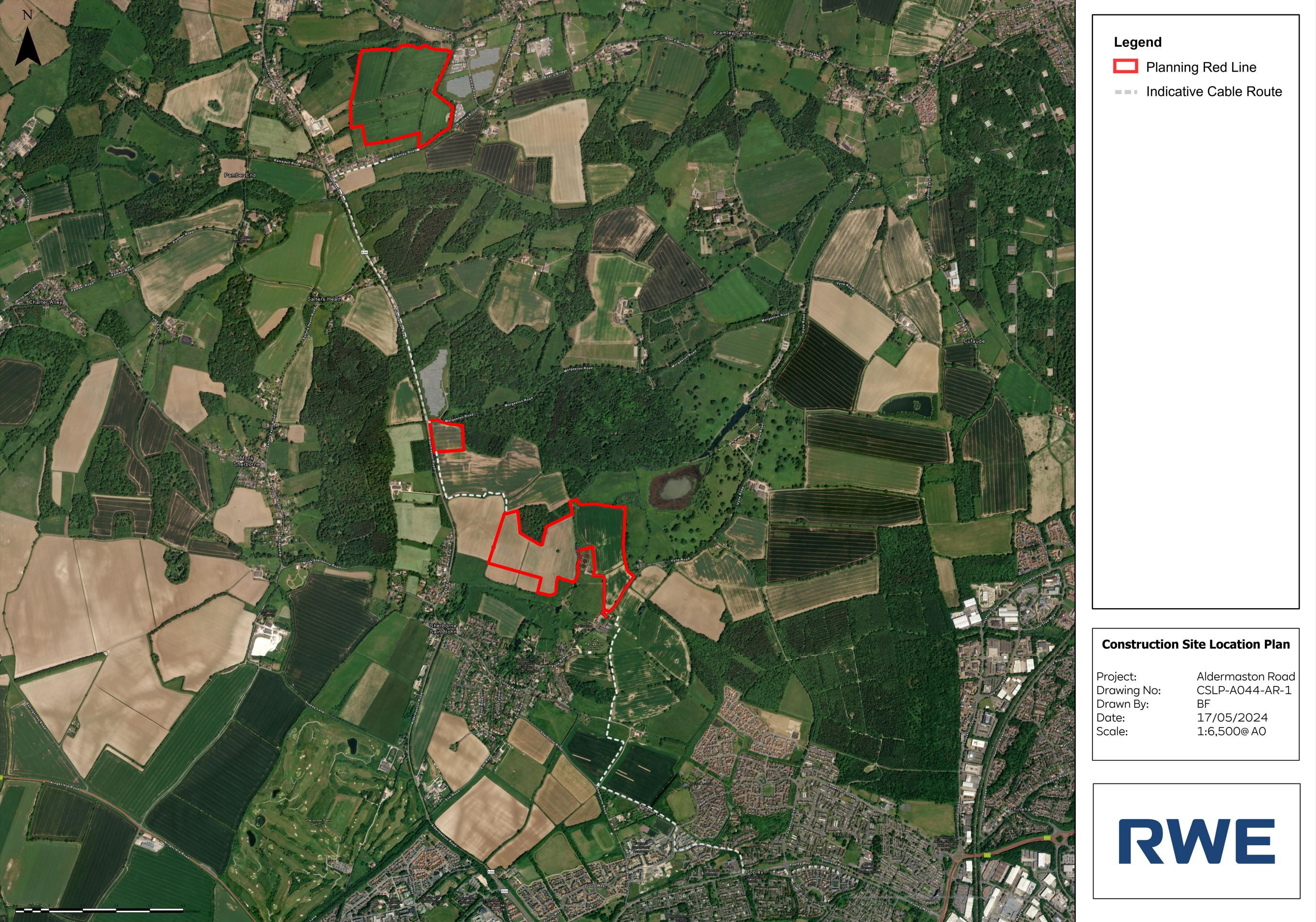 An aerial map showing a construction site plan with red outlined areas, farm fields, and wooded regions.